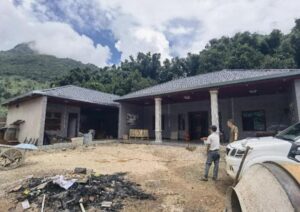 A home being reconstructed in rural Myanmar